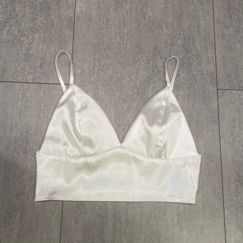 This is a brand new shiny white tank from shein